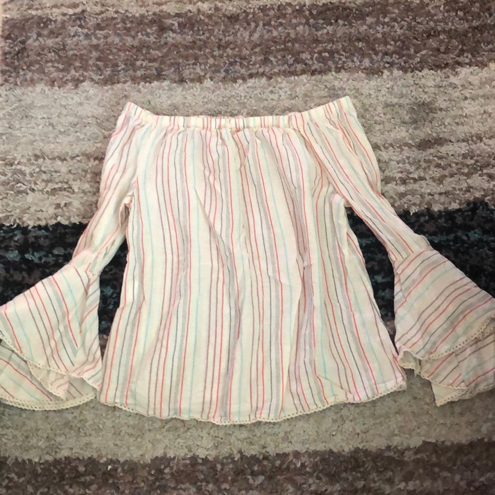 Solitaire off shoulder size large blouse.